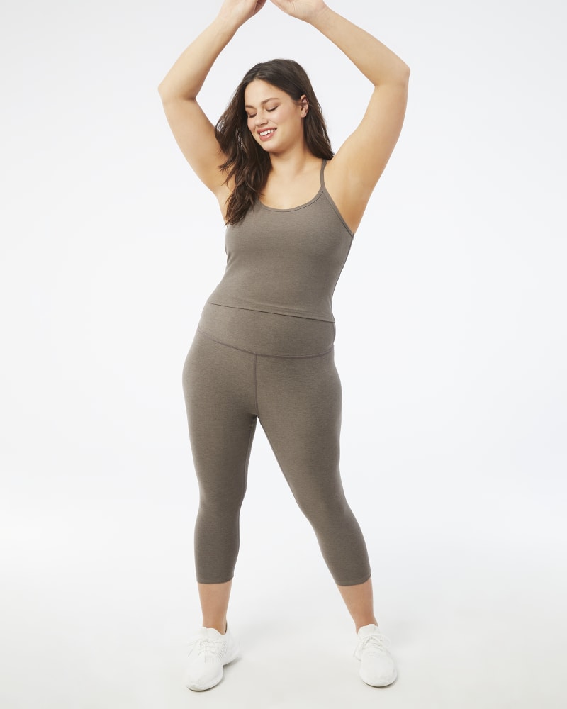 Plus size model with hourglass body shape wearing Hallie Racerback Tank Top by Beyond Yoga | Dia&Co | dia_product_style_image_id:157041